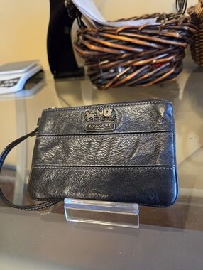 Coach Vintage Black Leather Wristlet with Silver Horse-and-Carriage Emblem